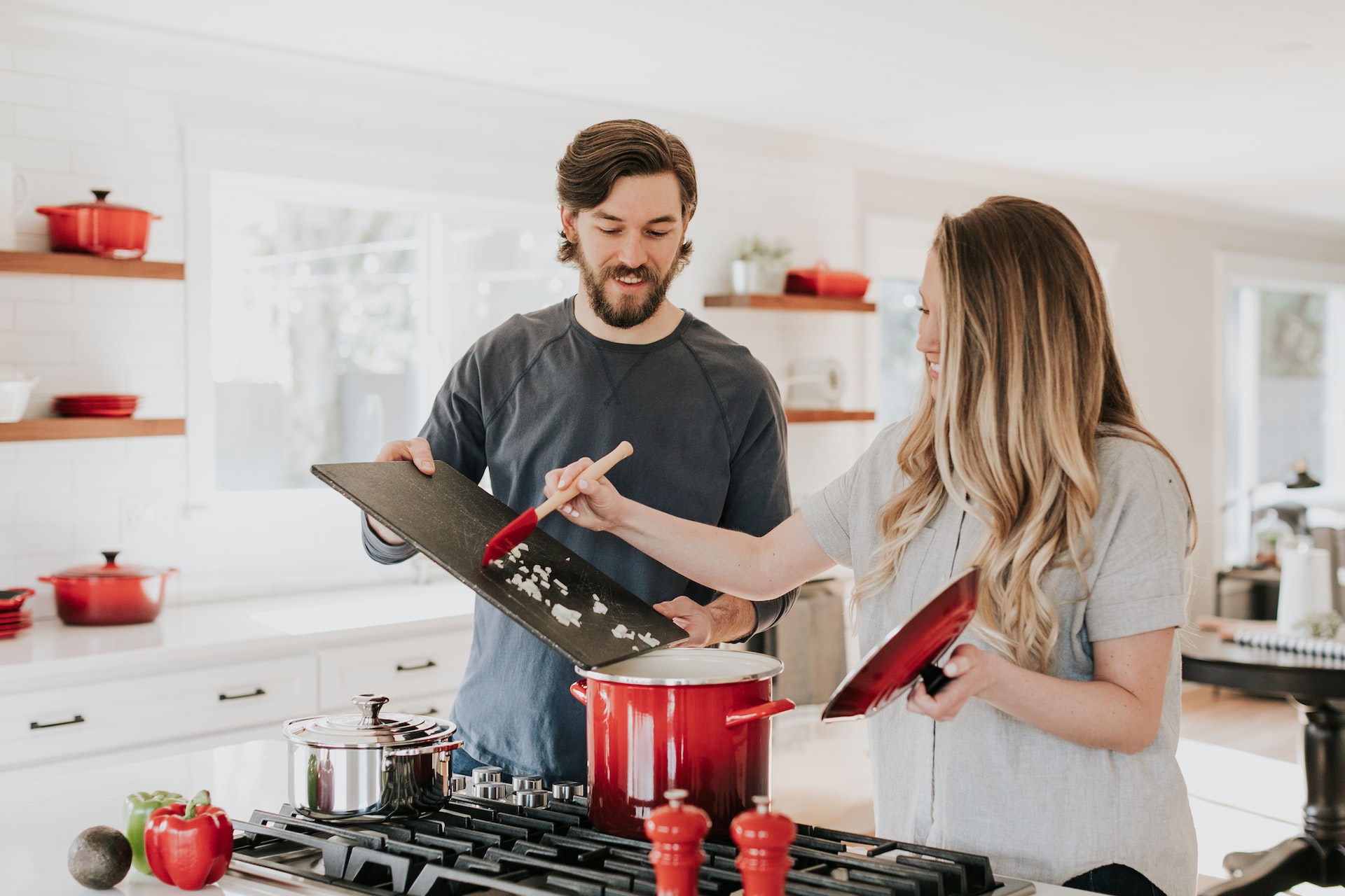 Couple in the kitchen - Best Ways To Lose Weight - RumboMag - Maintaining a healthy weight is important for overall health and well- being