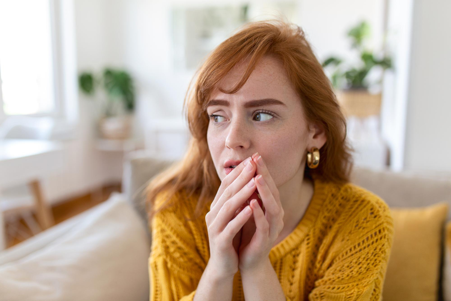 sad-woman-feels-miserable-desperate-sit-sofa-look-out-window-thinking-about-personal-troubles-does-see-way-out-difficult-life-situation-break-up-heartbreak-cheated-girl-concept - Overcoming negative self-talk is important for private growth and success. - RumboMag